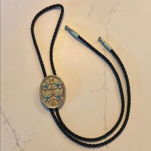 Western Bolo Tie with Silver Gold and Blue Accents